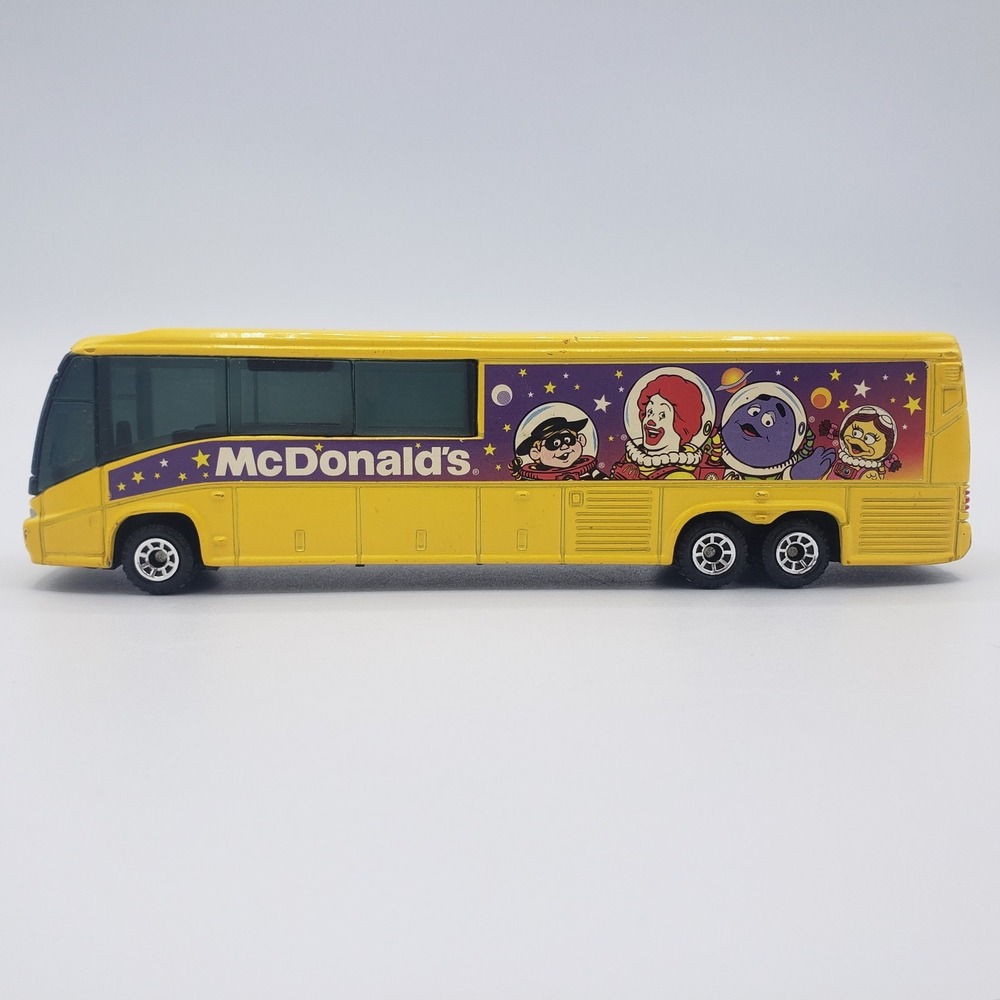 Matchbox 1999 McDonalds MCI Coach Tour Bus Yellow Diecast Ronald‎ Grimace Space